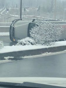 suv on side, lake tapps pkwy, auburn snow, mva, over turned suv