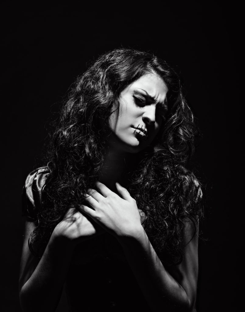 Silenced, mouth sewn shut, victim