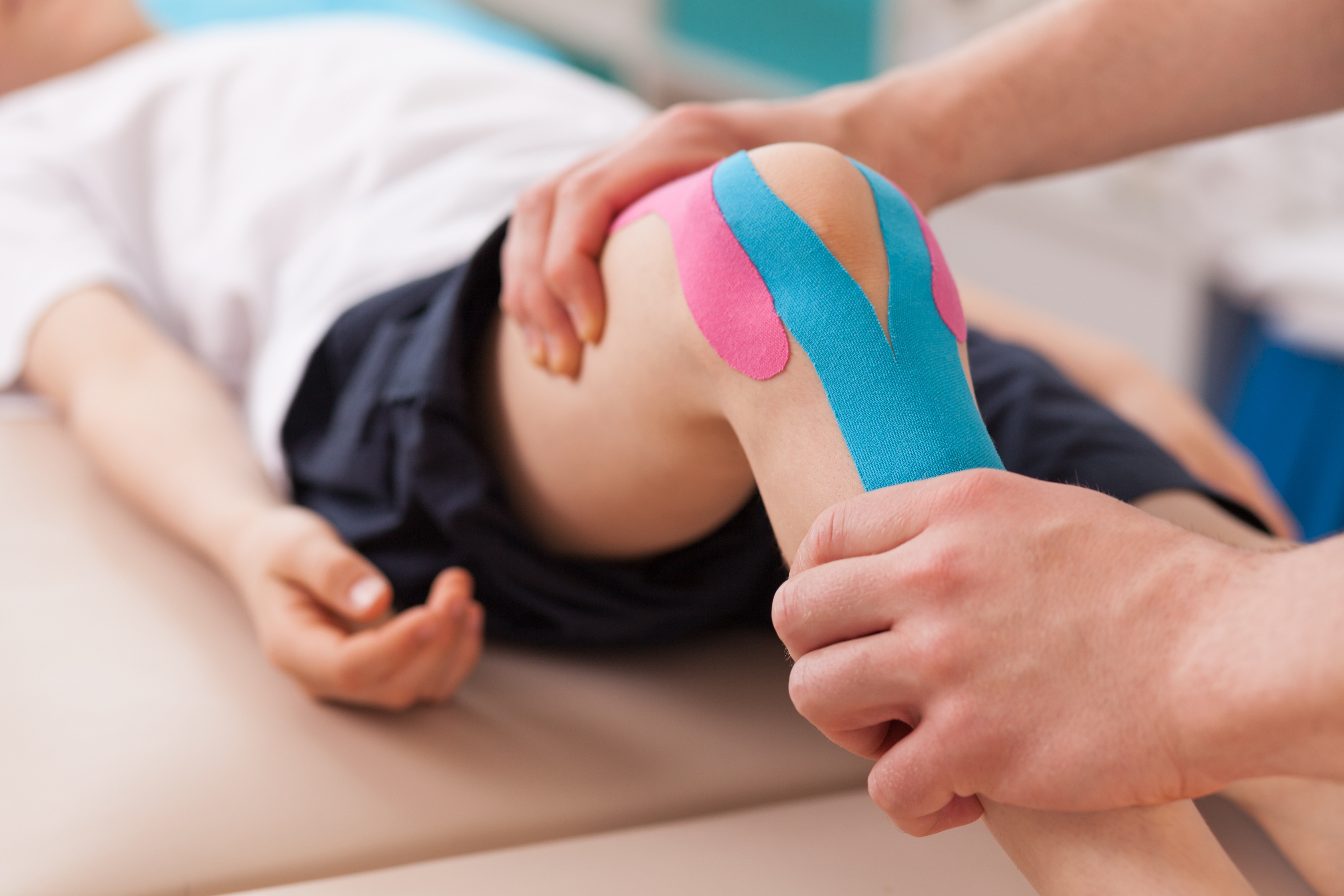 chiropractor, sports medicine, chiropractic adjustment, pearson chiropractor, Kinisiotape