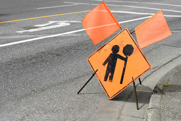 flagger, road work ahead