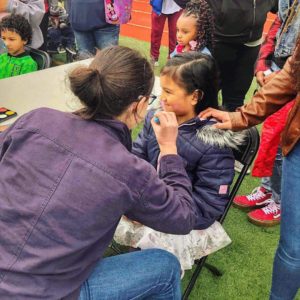 the hop, REVIVE Auburn, easter egg hunt, easter eggs from a helicopter, easter bunny, awesome inc, bounce house, community, community event, auburn memorial stadium,