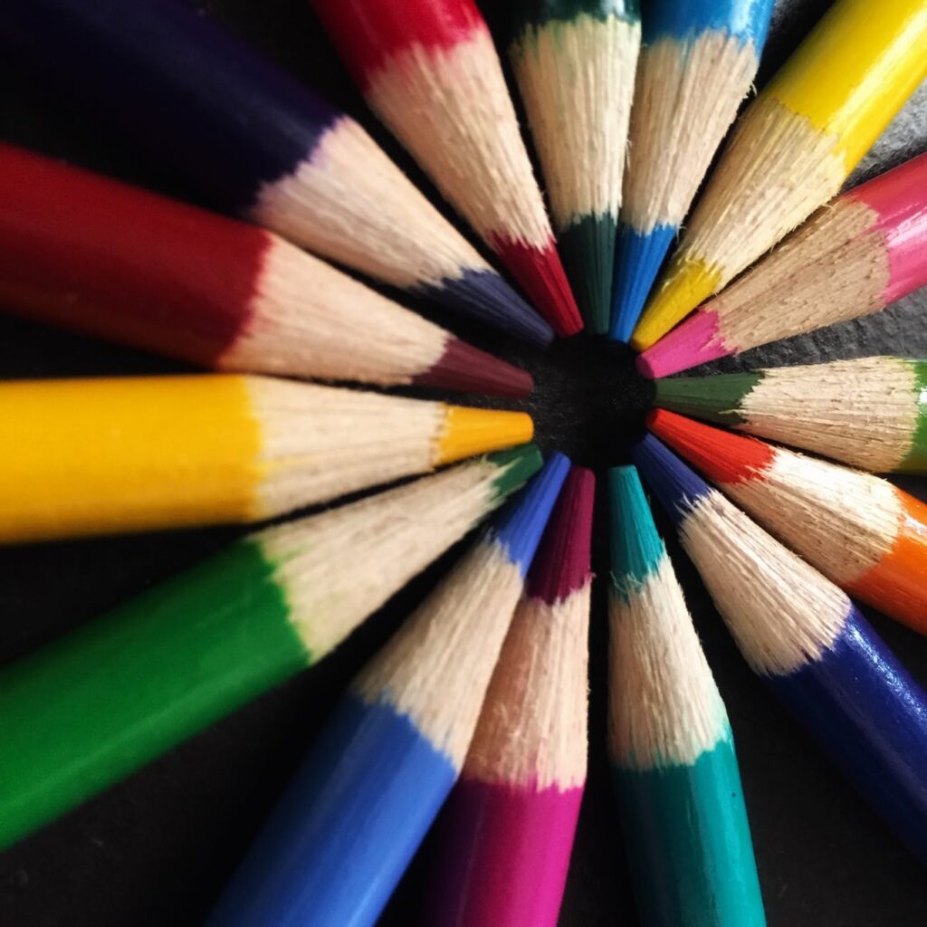 colored pencils come to a colorful circle at their points