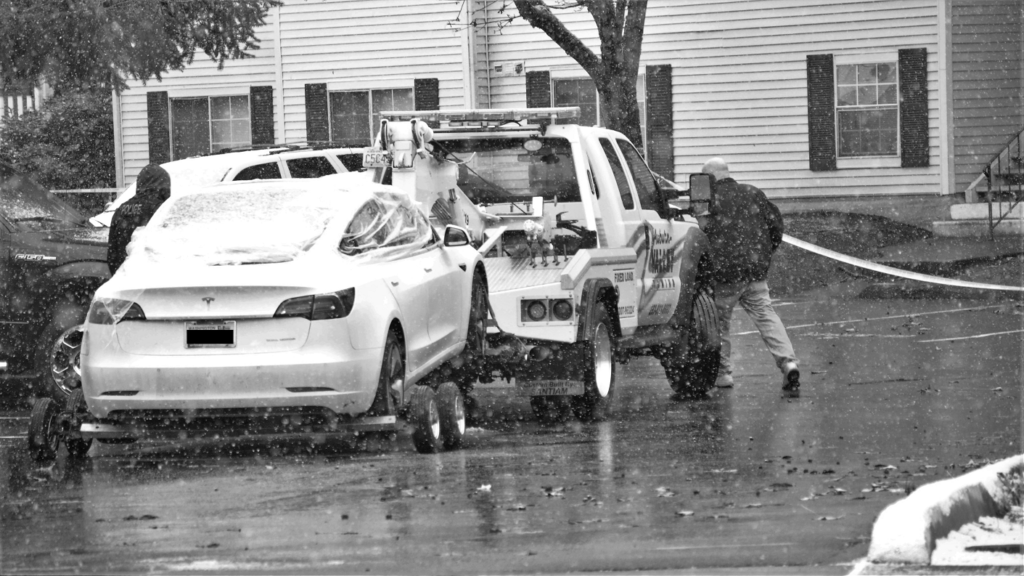 apd, auburn police, auburn wa shooting, auburn wa victim's car being towed, auburn valley towing, tesla