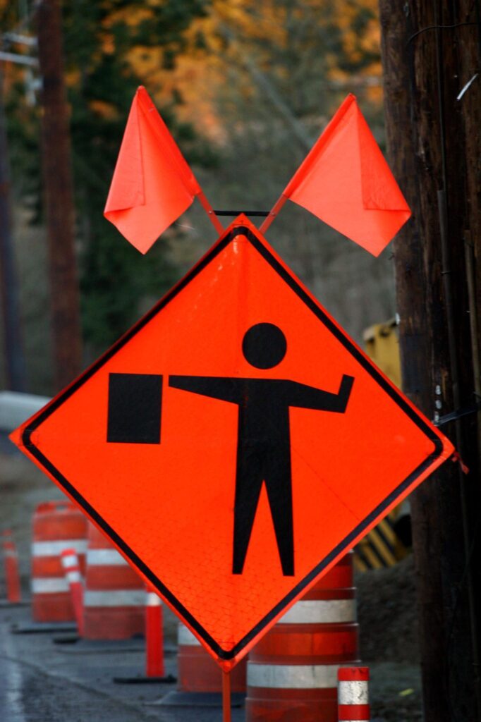 flagger, road work, construction site, traffic
