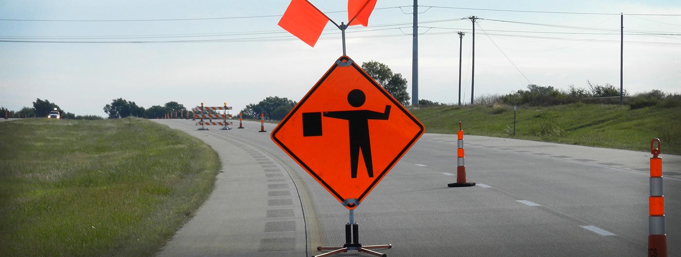 flagger, road work, construction, road work sign