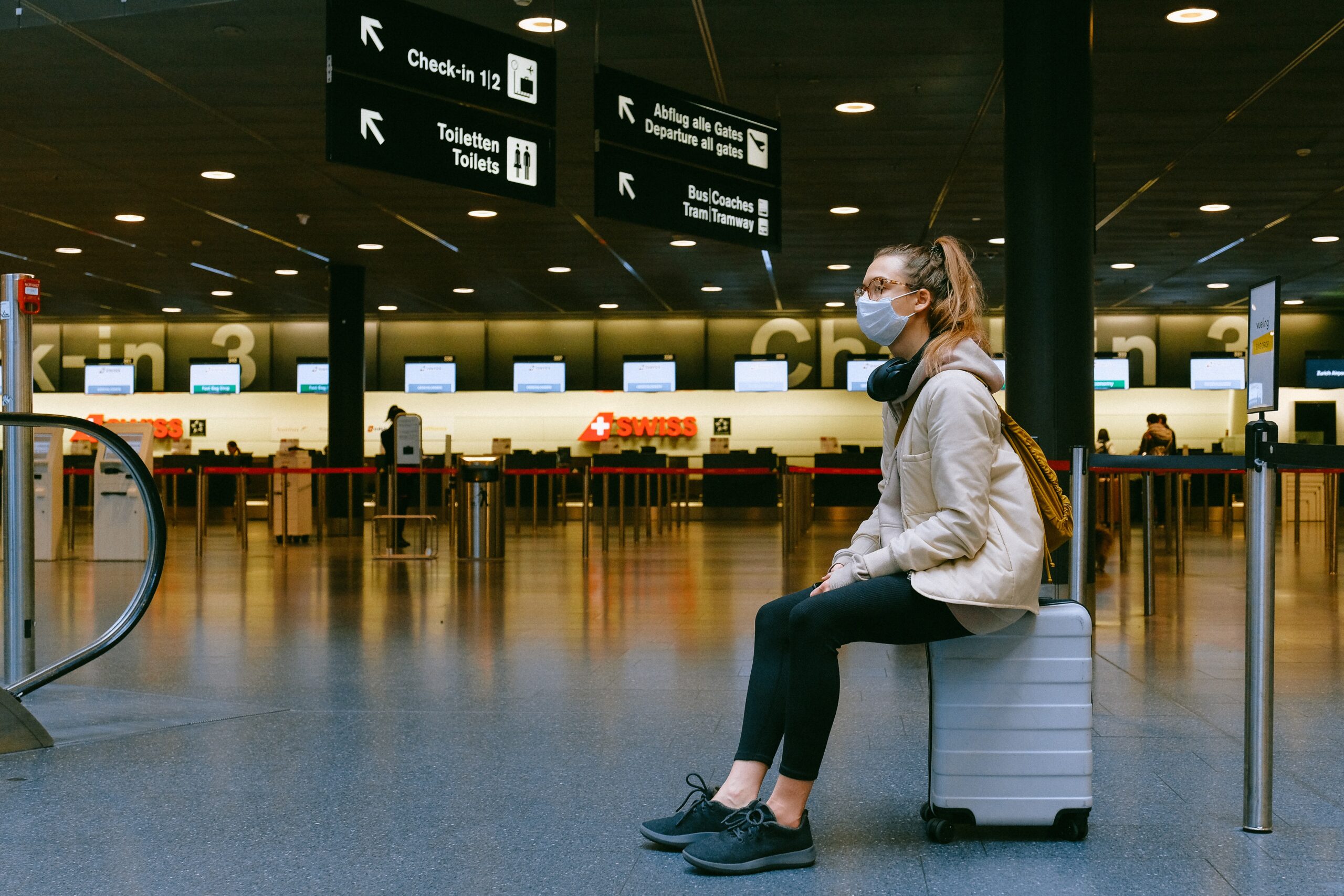 covid-19, covid-19 traveler, masked traveler, airport, covid-19 airport, international travel, quarantine, travel quarantine,