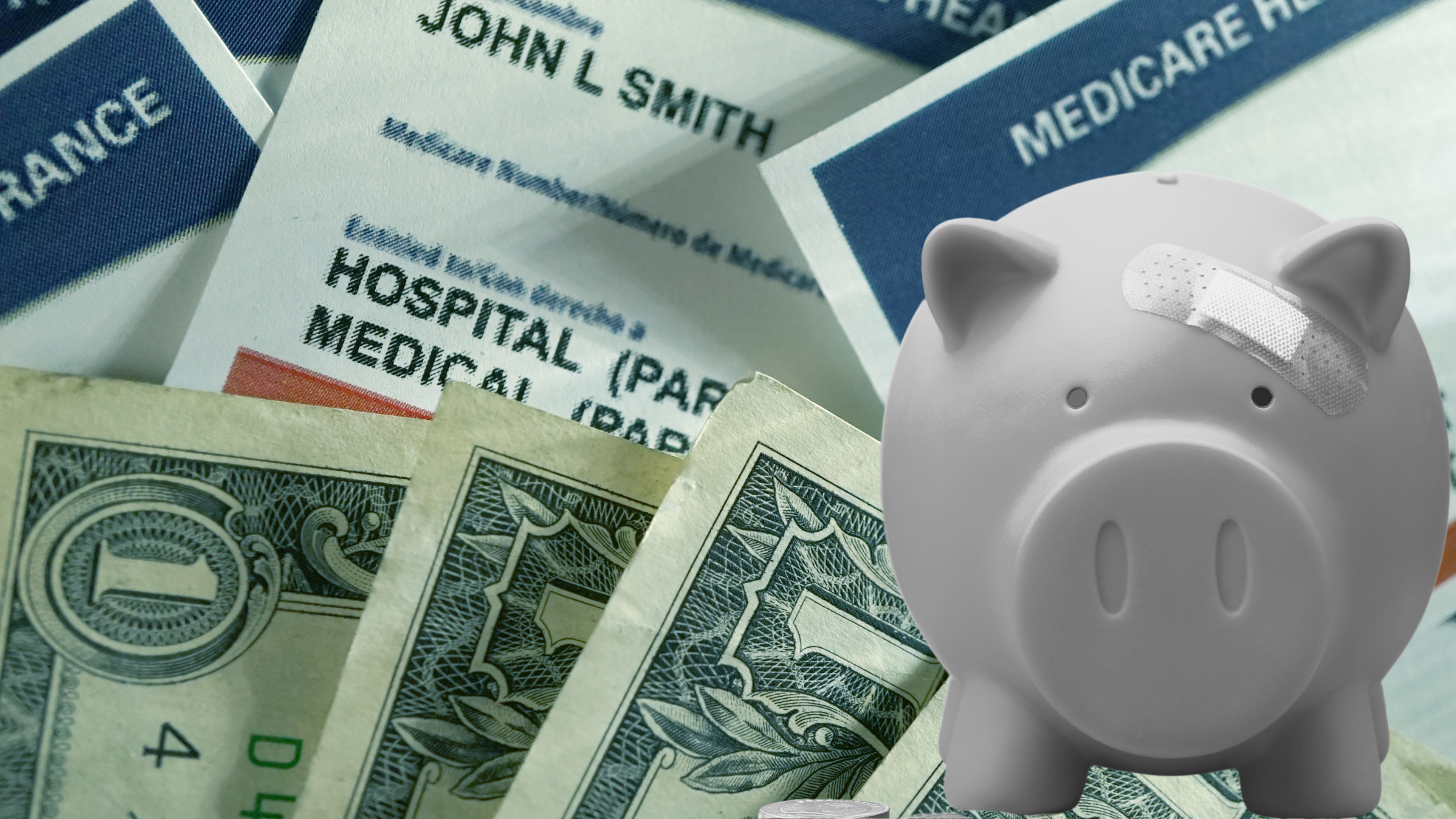 A pale, ounded piggy bank with a bandaid over its eye sits before a backdrop of a pile of dollar bills and Medicare cards.