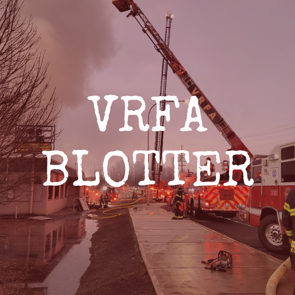 VRFA fire trucks and emergency staff fight a fire. A red overlay covers the image with "VRFA Blotter" written in white text across the graphic.