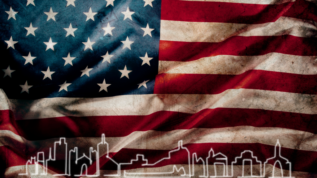 An American flag with a white Atlanta skyline outline at the bottom