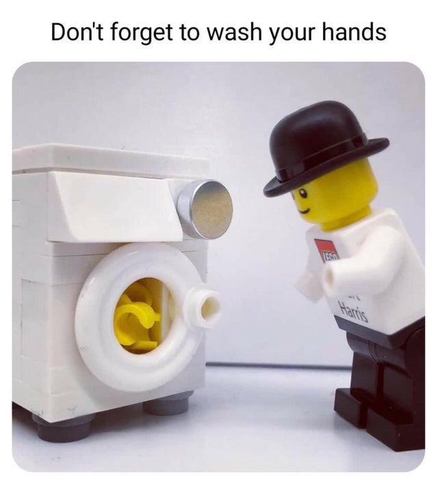 A lego man stands in front of a lego washing machine looking at his hands inside a Leho washing machine. Above the photo says :Don't forget to wash your hands