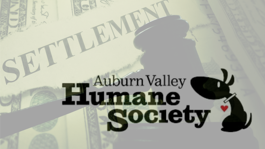 A lawsuit settlement graphic overlaying the AVHS logo