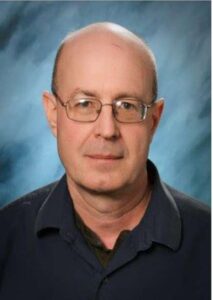 A headshot of October's Staff Member of the Month, Ron Fricks