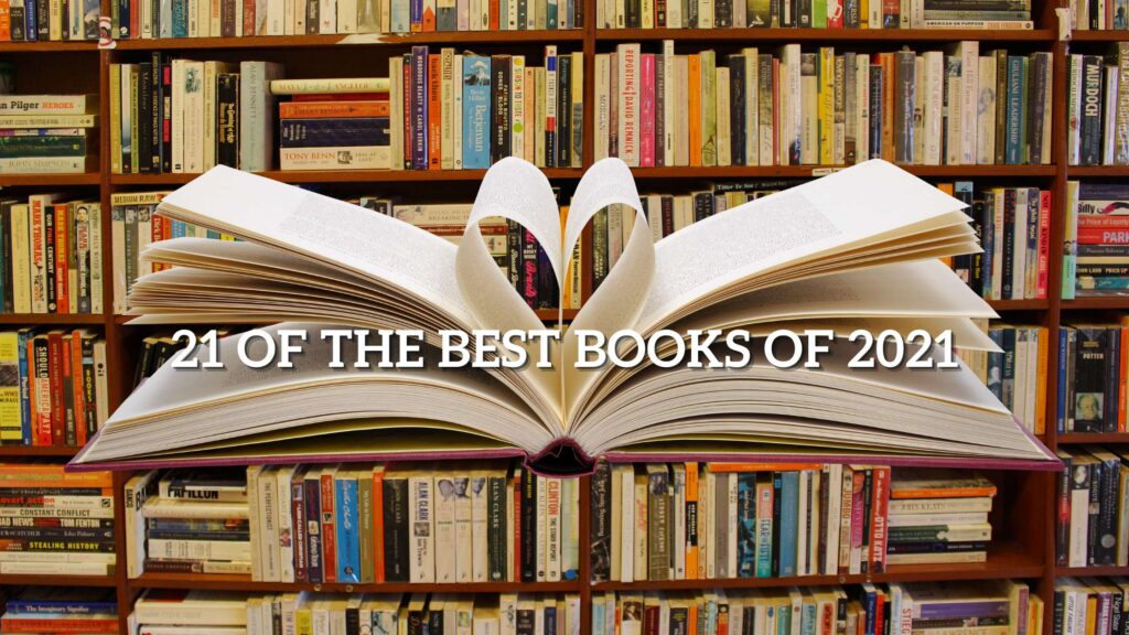 A book is opened with 2 pages folding to make a heart. The graphic background is shelves packed with books.