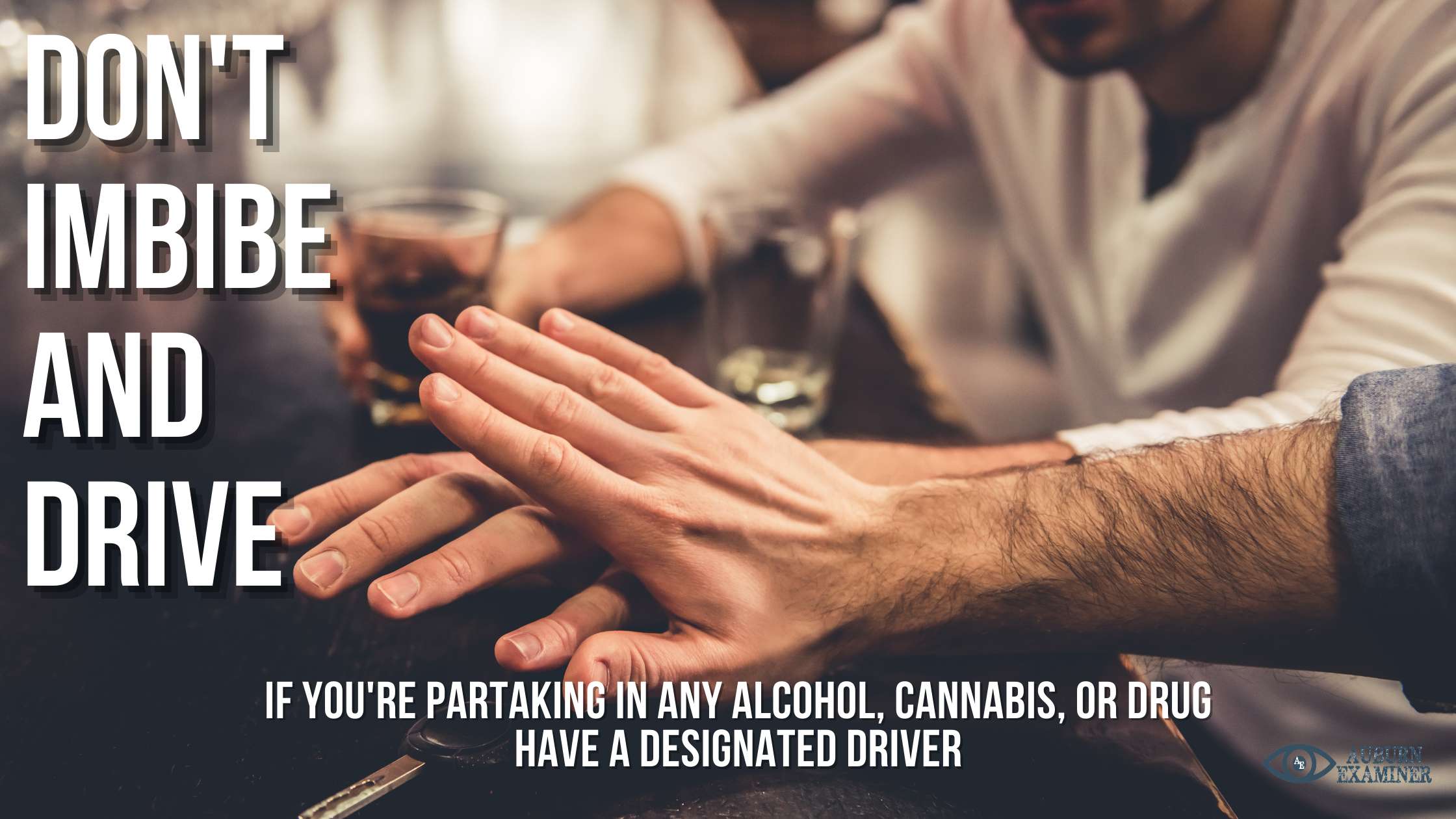 A man holds back a patron's hand as he reaches for keys on a bartop. Text on the graphic advise not to imbibe and drive