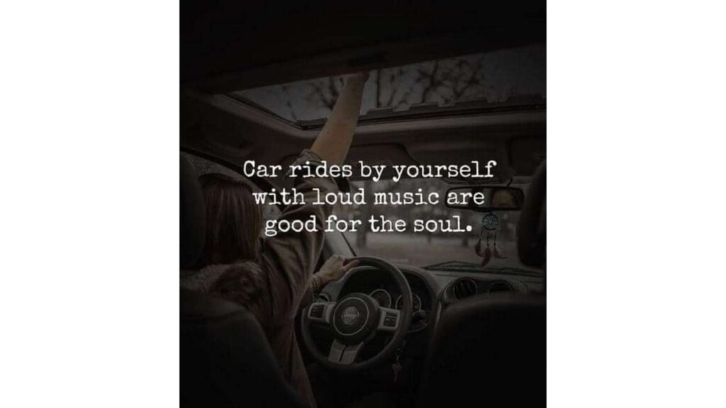 a girl holds her hand out the open sunroof of her car as she drives. Text overlays the image that reads" car rides by yourself with loud music are good for the soul"
