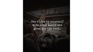 a girl holds her hand out the open sunroof of her car as she drives. Text overlays the image that reads" car rides by yourself with loud music are good for the soul"
