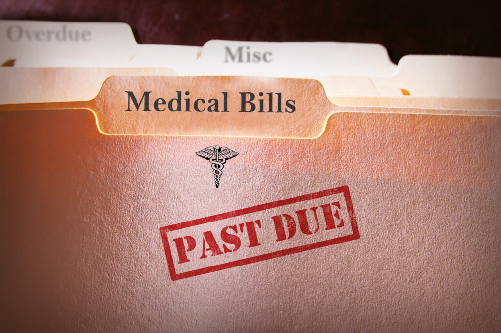 File folders with Past Due Medical Bills text
