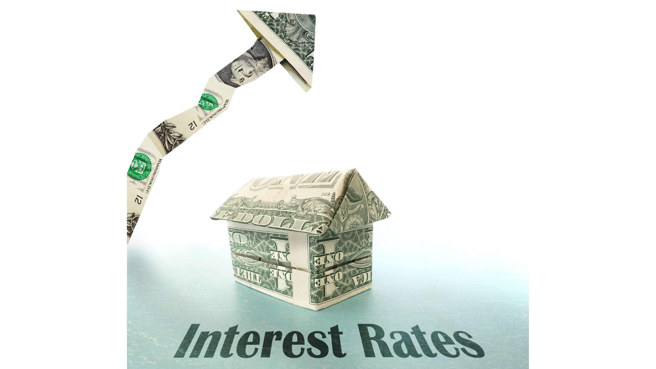 a house made of dollar bills sits under a jagged arrow, also made of money, rising above it