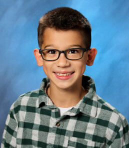A standard yearbook photo of a male child