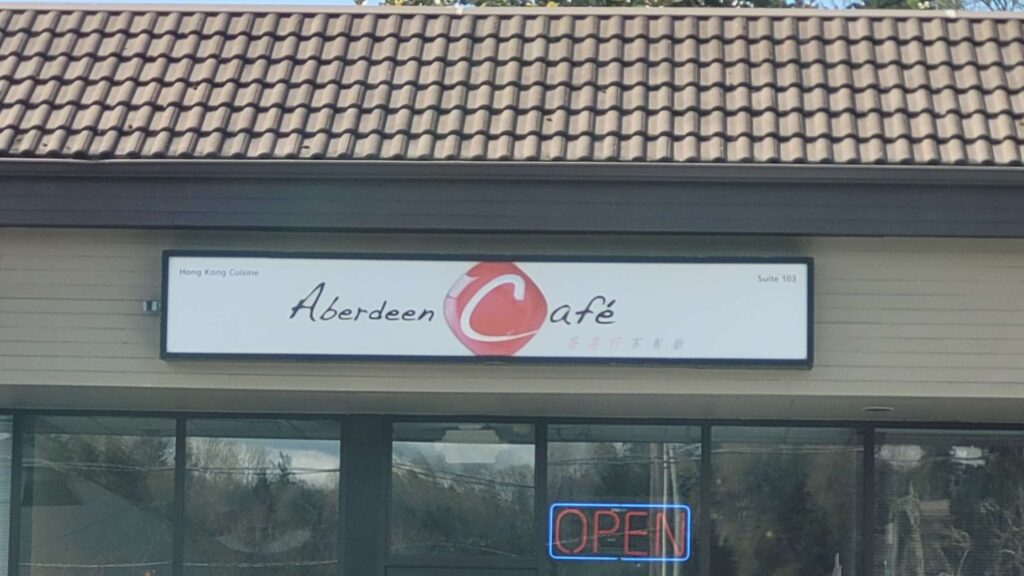 An overhead storefront sign for Aberdeen Cafe