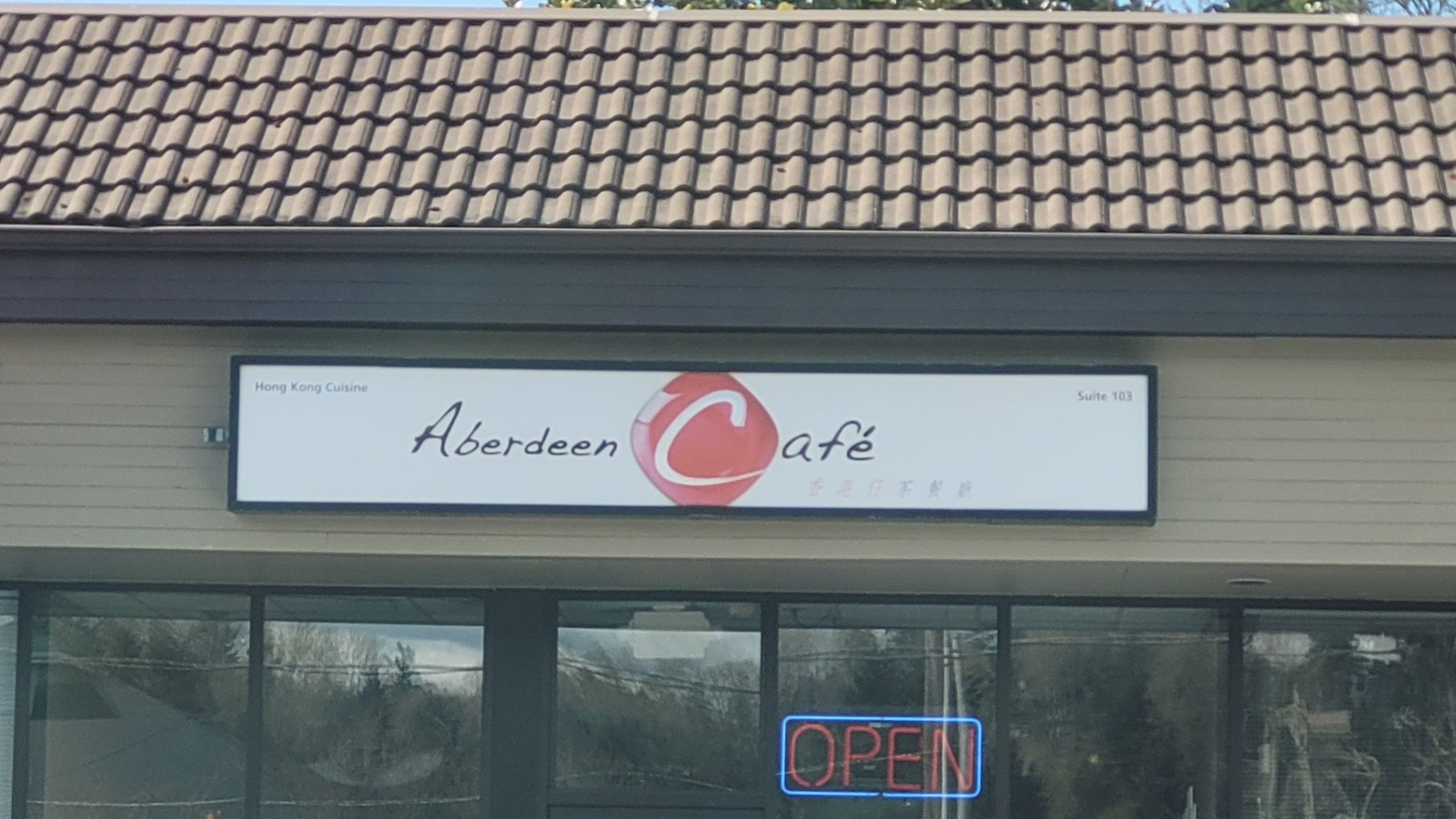 An overhead storefront sign for Aberdeen Cafe