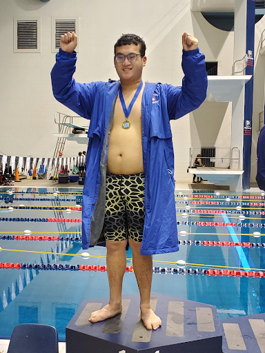 Auburn Mountainview student David Le stands on the first place podium after winning the 3A state champion.