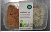 A grocery store tin tray of red lentils